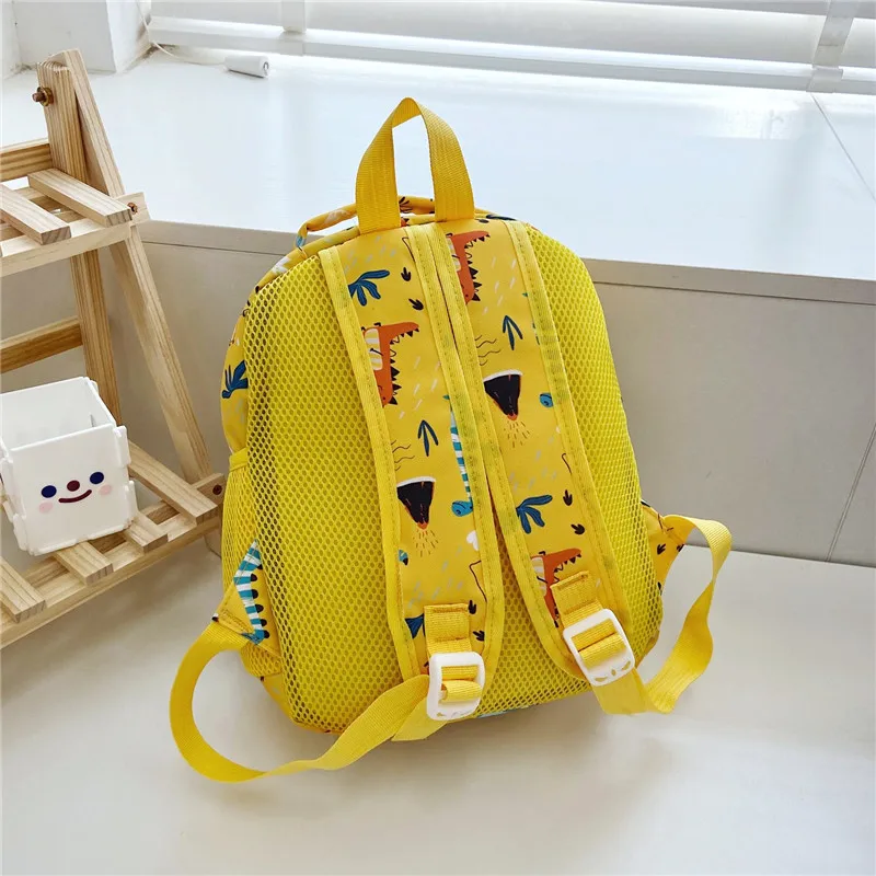 Mochila de dinosaurio para niños, morral escolar de dibujos animados, 5 colores