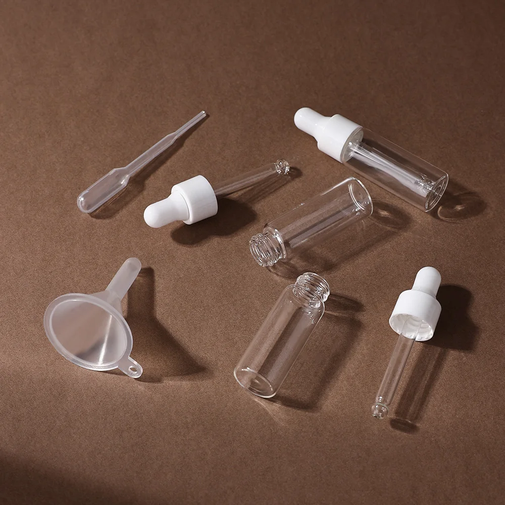 5/10 pezzi Bottiglie vuote per olio essenziale con contagocce in vetro sottile da 5 ml con set di coperchi bianchi con imbuti e contagocce ideali per olio essenziale