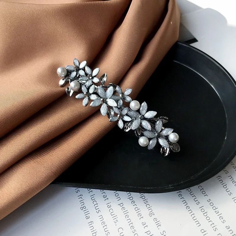 New Korean version of the retro daisy spring hair clip simple half-tie hair top clip elegant female fashion hair accessories