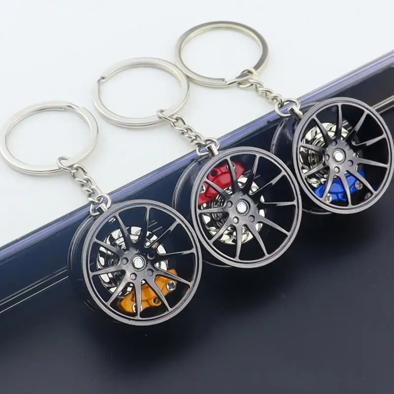 1Pcs Wheel Hub Car Key Chain Fidget Toy Car Tire Brake Disc Keychain Fingertip Gadget Keyring Bags Pendant 3D Alloy Model Gift