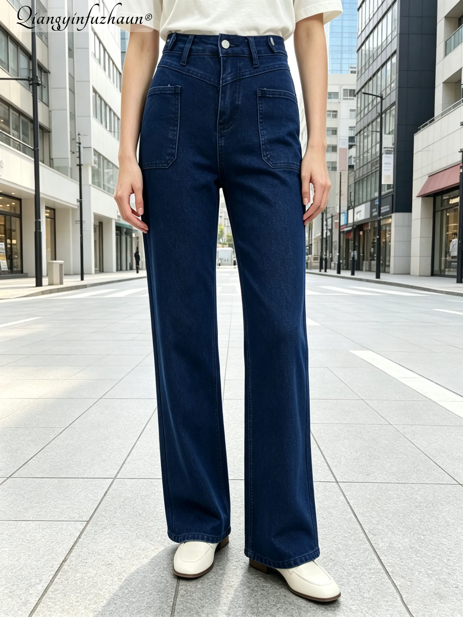 Simple front flap denim pants for women. Washed blue, loose-fitting, straight-leg, suitable for both work and casual wear, versa