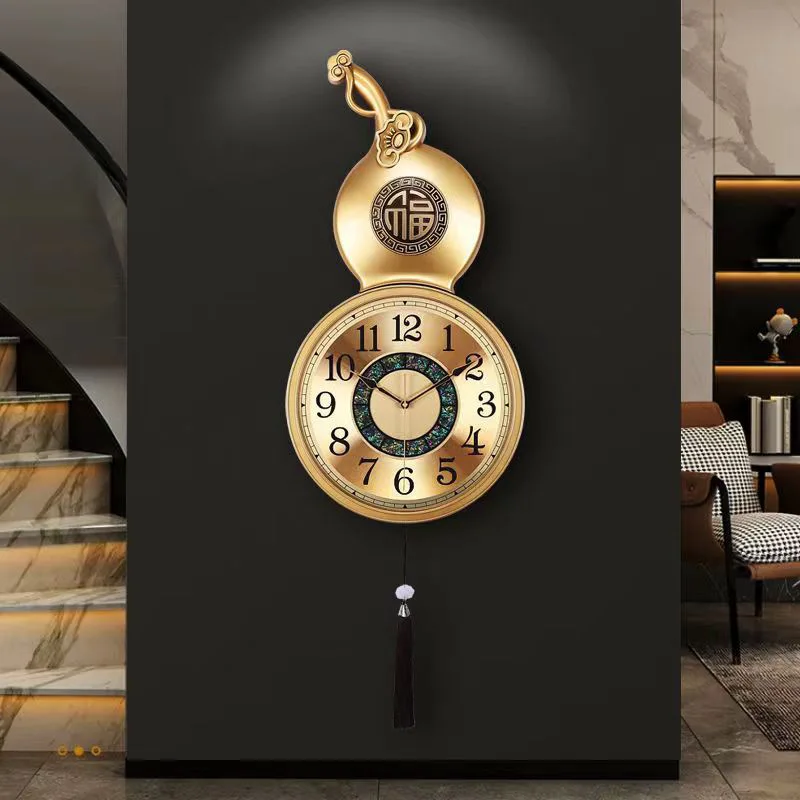 

New Chinese-style brass wall clock Brass color gourd decorative wall clock Home living room table Wall-mounted villa Creative