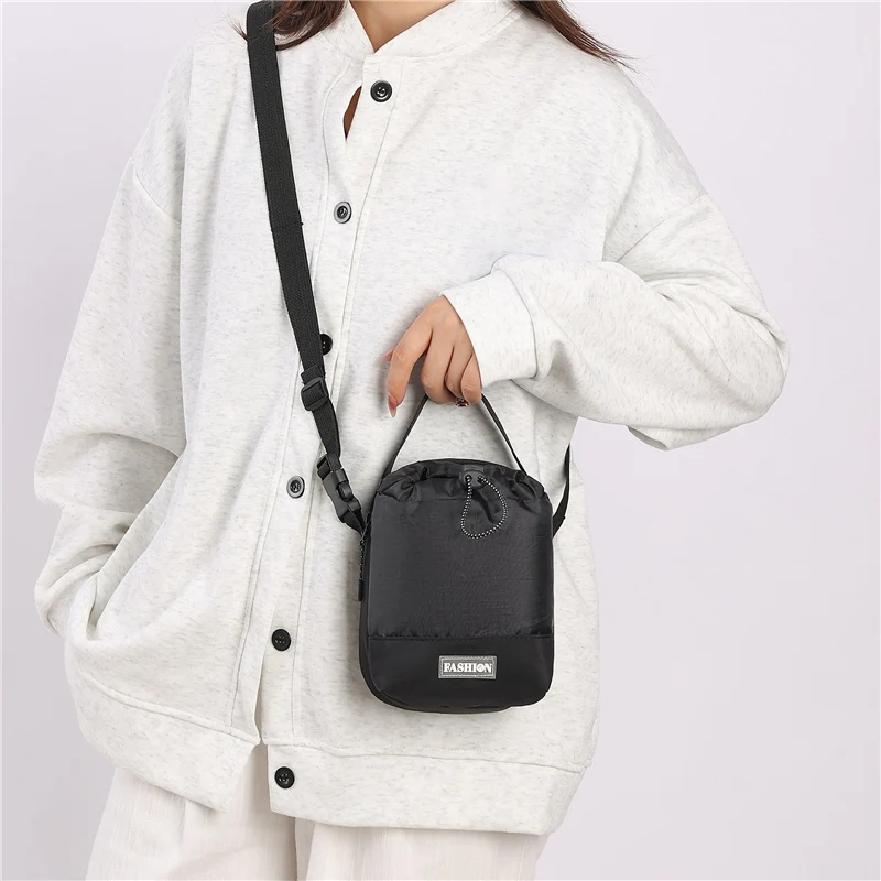 Waterproof Nylon Crossbody Sling Bag - Outdoor Travel Pouch with Dedicated Water Bottle Pocket