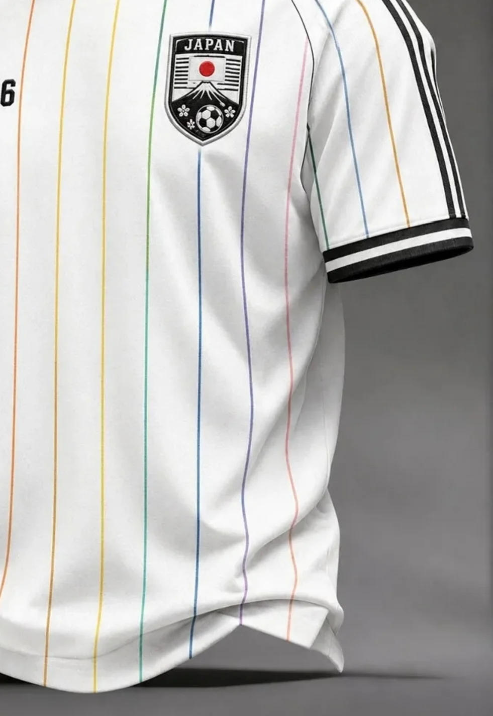 Japan National Football Team T-Shirt – Featuring the team crest with Mount Fuji, cherry blossoms, and the rising sun flag; ideal
