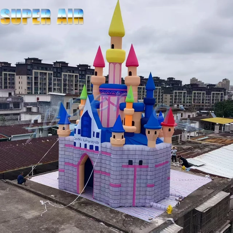 Parque de atracciones para niños, castillo colorido inflable gigante para exteriores con soplador a la venta