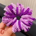 50 purple pieces
