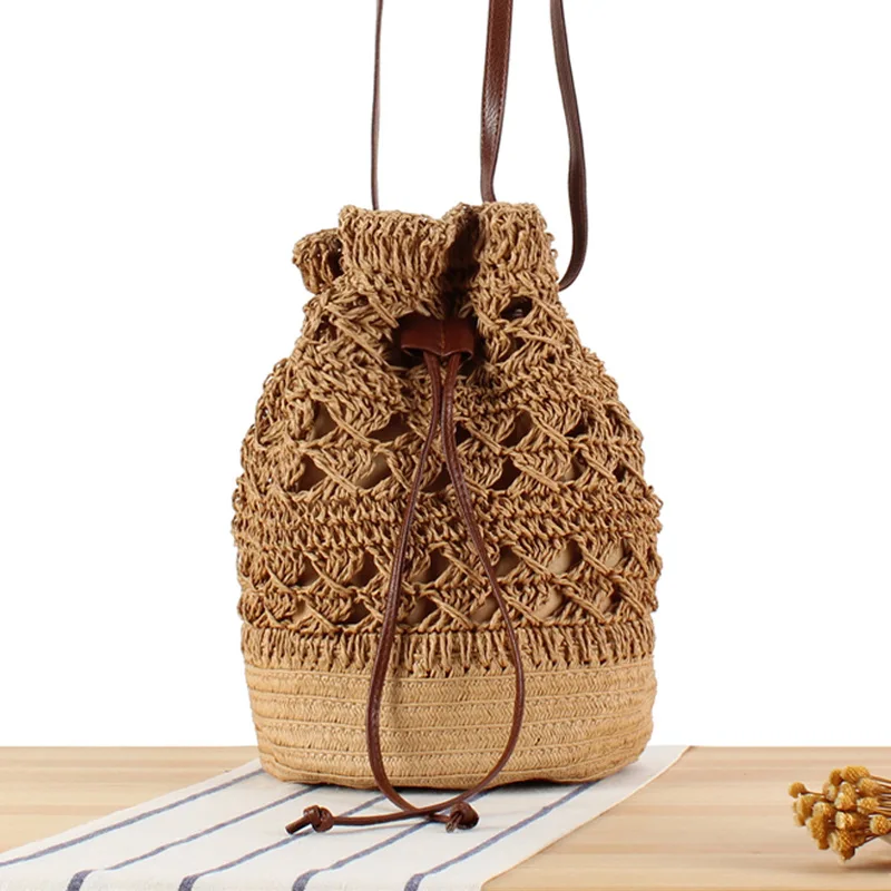 

New Hollow Bucket Hand-woven Shoulder Beach Bag Seaside Resort Straw Women's Bag