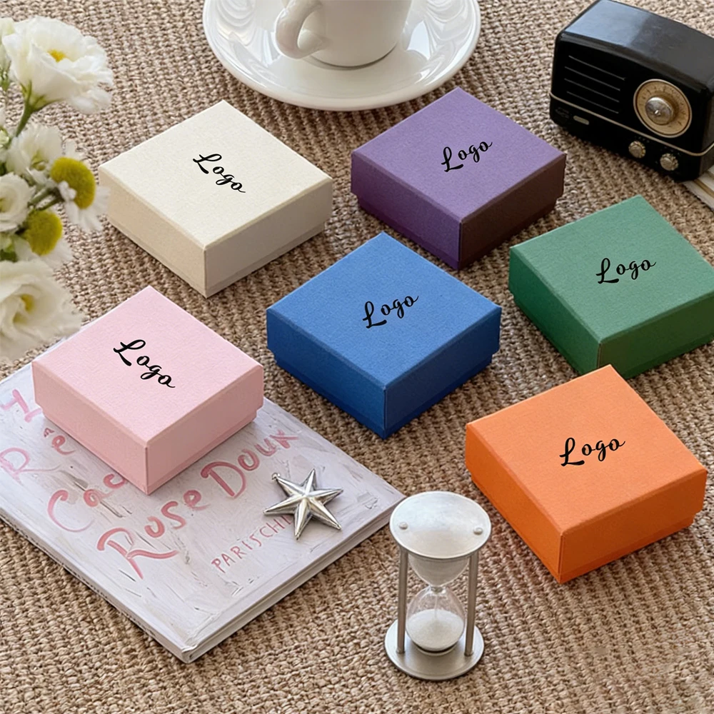 

50Pcs/Lot Custom Logo Texture Paper Jewelry Box 8x8x4cm Earrings Ring Necklace Pendant Studs Perfume Pouch Travel Organizer Case