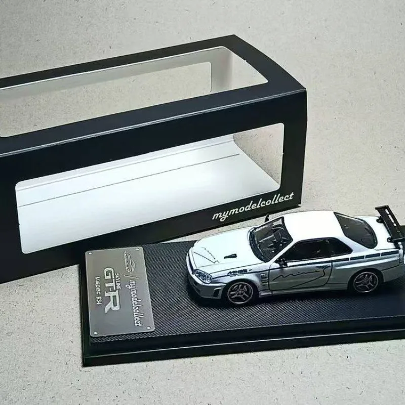 in stock: 1:64 GT-R R34 alloy high-end realistic car model. Creative decorative item. Festival gift.