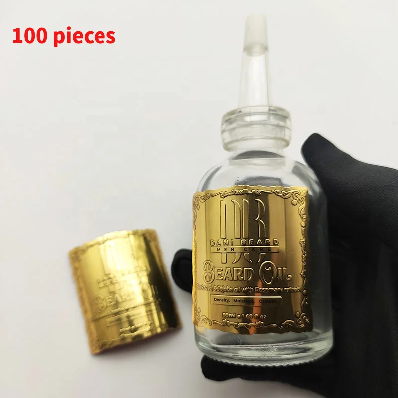 

10 0.Zhang. custom. Custom design luxury 3D metal logo aluminum foil labels glass bottles packaging