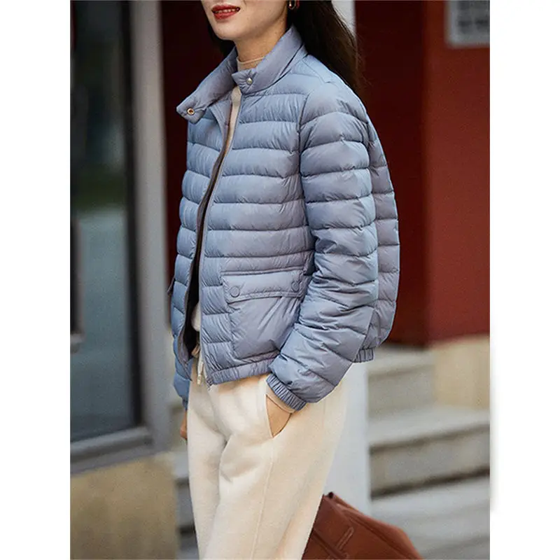 

2025 Новый легкий пуховик с воротником-стойкой для женщин, зимняя свободная и модная универсальная и легкая куртка