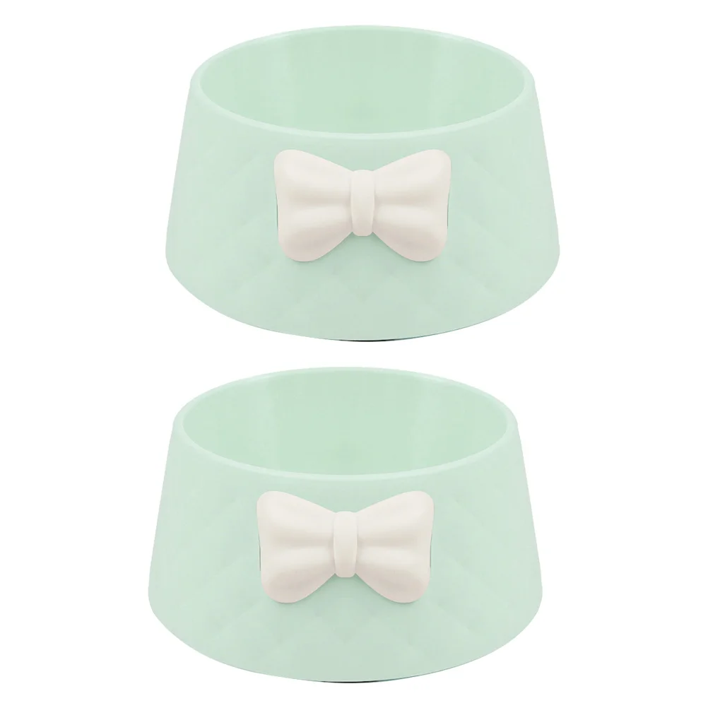 قطعتان من وعاء تغذية الحيوانات الأليفة البلاستيكي المستدير للكلاب والقطط مع تصميم بعقدة على شكل فيونكة خفيف الوزن ومحمول من مادة صحية باللون الأخضر