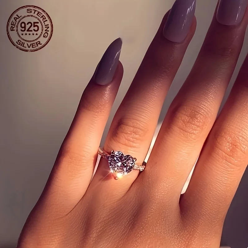 خاتم فاخر أنيق من الفضة الإسترليني عيار 925 على شكل قلب من الزركون للخطوبة والزفاف ونمط لامع للنساء