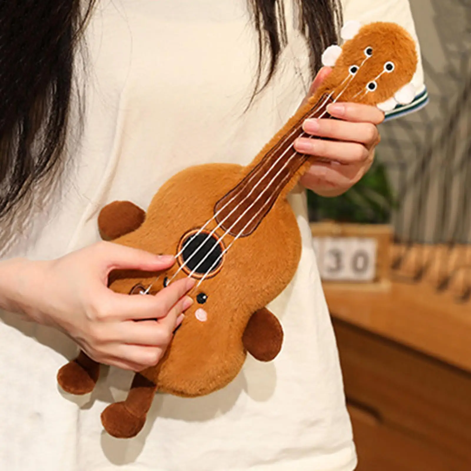 

Cute Stuffed Guitar Doll simulation musical instrument plush Skin-Friendly Sleeping Companion for Kids Teens Birthday Gift