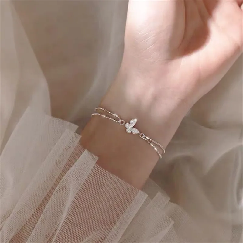 Nueva pulsera de mariposa y flor de circón brillante dulce de Corea para Mujer y niña, pulsera de cadena de Color plateado, joyería de moda, Pulseras para Mujer