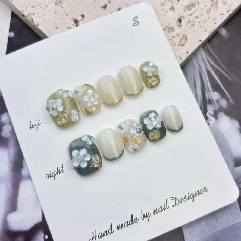 

Набор из 10 накладных ногтей ручной работы с 3D-цветами, средней длины, в форме гробика, высококачественные, милые, с клеем, корейские акриловые накладные ногти 2026