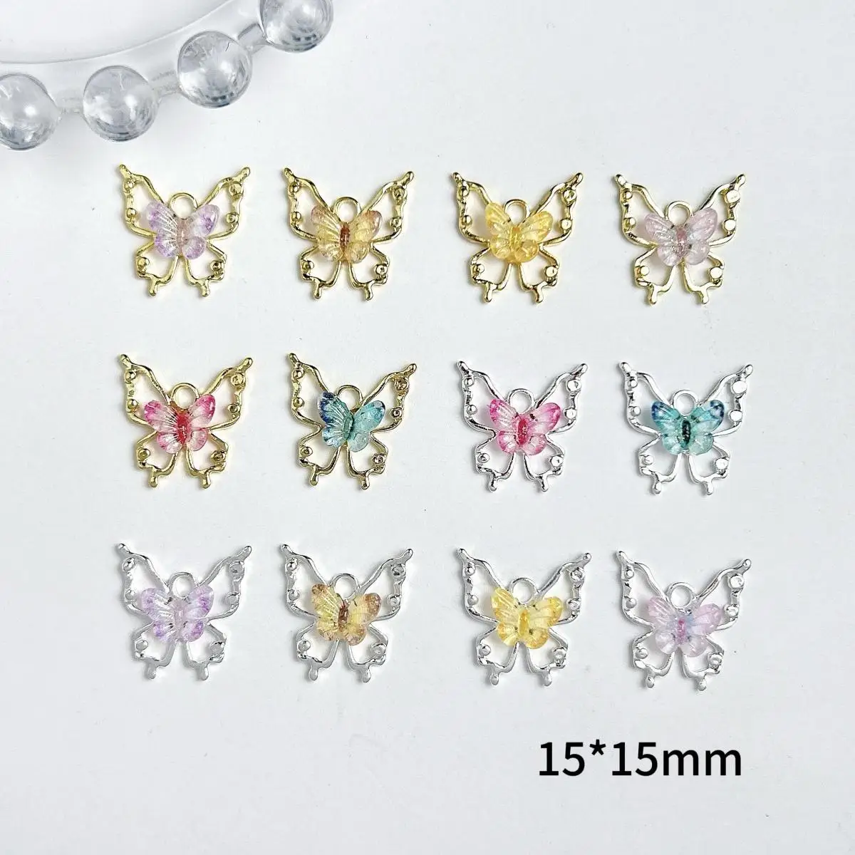 15PCS Hollowed-out Alloy Butterfly Nail Charms Translucent Gradient Butterfly Inlaid Resin Nail Art Decorations DIY Pendant Nail