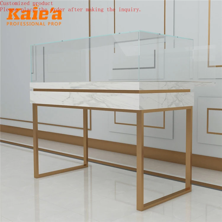 

Jewelry Shop Furniture Gold Stainless Steel Jewelry Display Table Cheap Jewelry Glass Display Showcase with Storage Cabinet