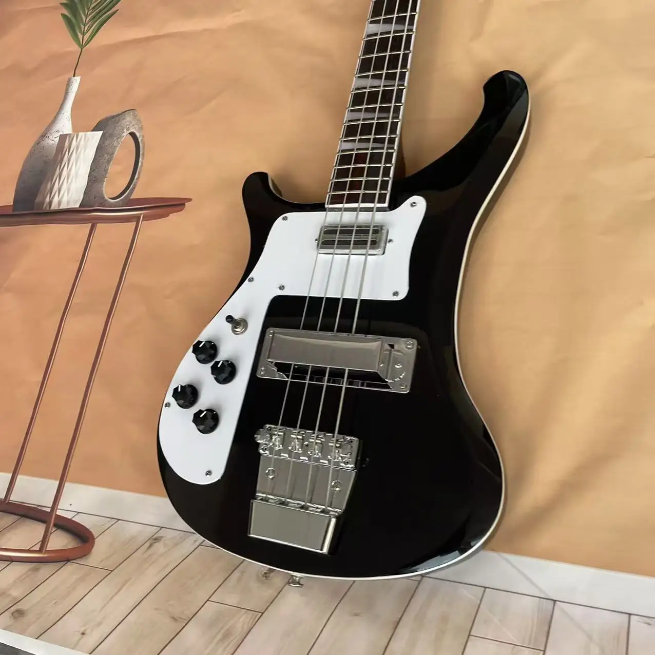 Black left-hand 4-cord electric bass, real shipping picture, in stock