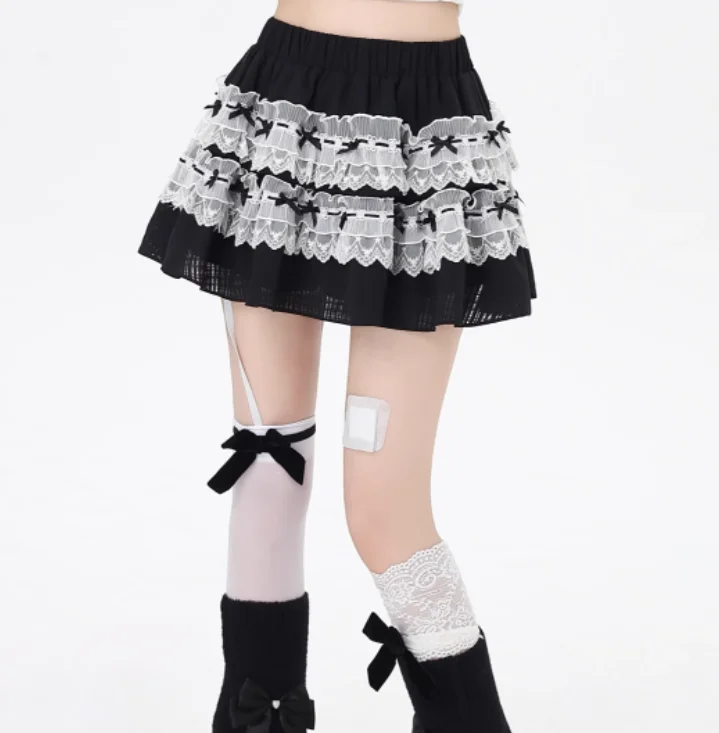 กระโปรงลูกไม้สีดำขาวสไตล์ญี่ปุ่นน่ารัก ดีไซน์โบว์  กระโปรงทรงเค้กเอวสูง  แฟชั่นฤดูใบไม้ผลิและฤดูร้อน  ใส่ได้หลากหลาย  ช่วยให้ดูอ่อนวัย