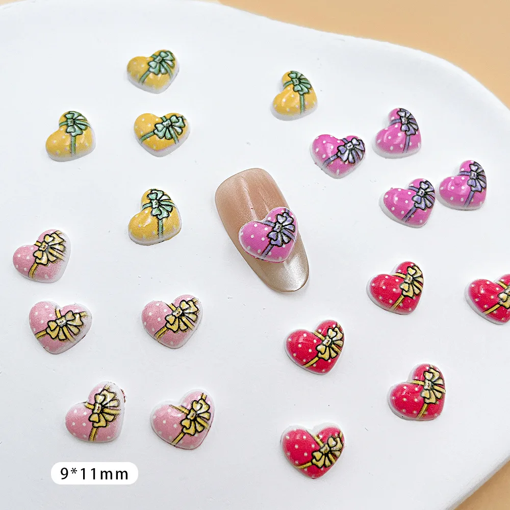 100 unids/pack 9 × 11mm caja de regalo de corazón dijes de resina para uñas-arte de uñas con lazo 3D, bonita decoración de uñas a presión para manicura romántica DIY