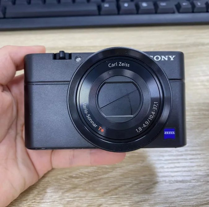 

95%NEW-Sony Cyber-Shot DSC-RX100 20.2MP 3.6x Compact Digital Camera in English