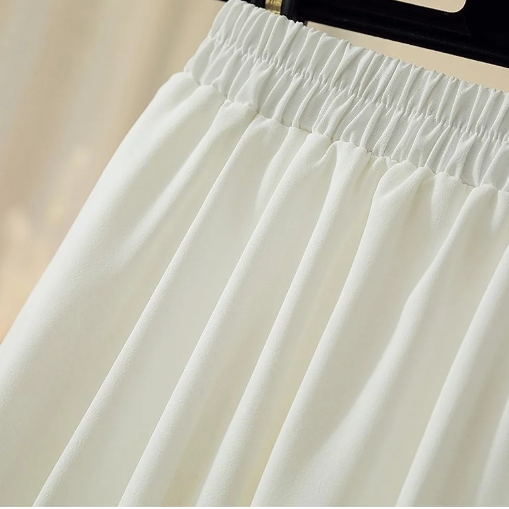 Modne krótkie spódniczki z marszczeniami Elegancka puszysta mini spódniczka Plisowane spódnice w kształcie litery A z wysokim stanem dla kobiet