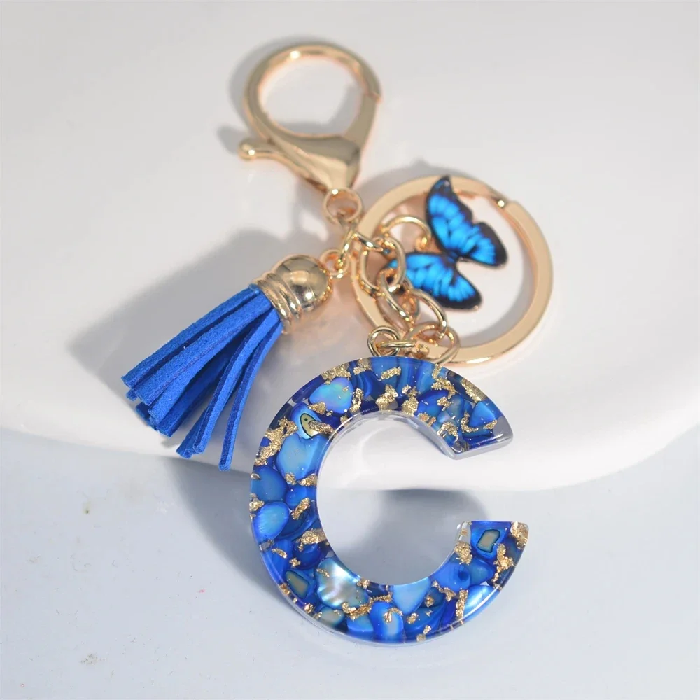 Modischer blauer glasierter Stein, A bis Z, Buchstaben-Schlüsselanhänger, 26 Initialen, Alphabet, Schmetterling, Quaste, Anhänger, Auto-Schlüsselanhänger, Damenschmuck, Geschenke