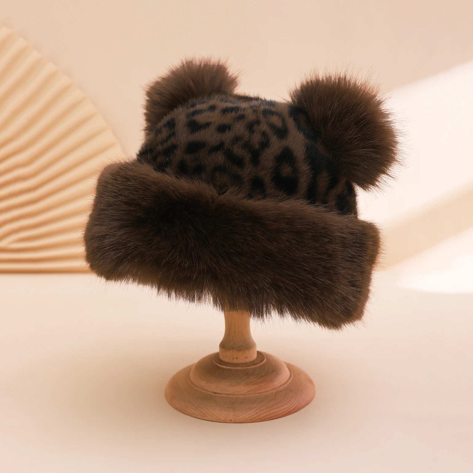 The new leopard-print plush big-eared fun hat is a cute and warm woolen cap for outdoor travel in autumn and winter