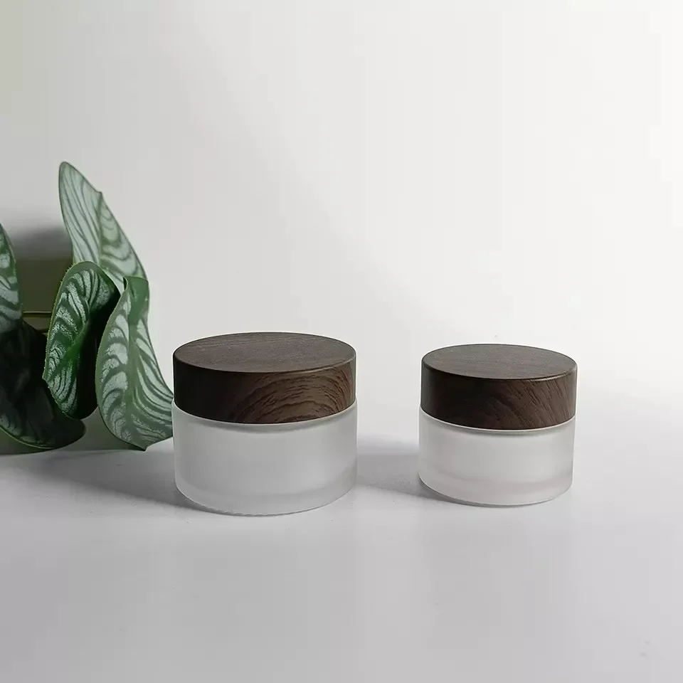 قناع كريم الوجه التجميلي، حاوية مستحضرات التجميل، برطمانات كريم بلوري، لوشن الجسم الزجاجي الشفاف غير اللامع مع أغطية خشبية داكنة بلاستيكية #5