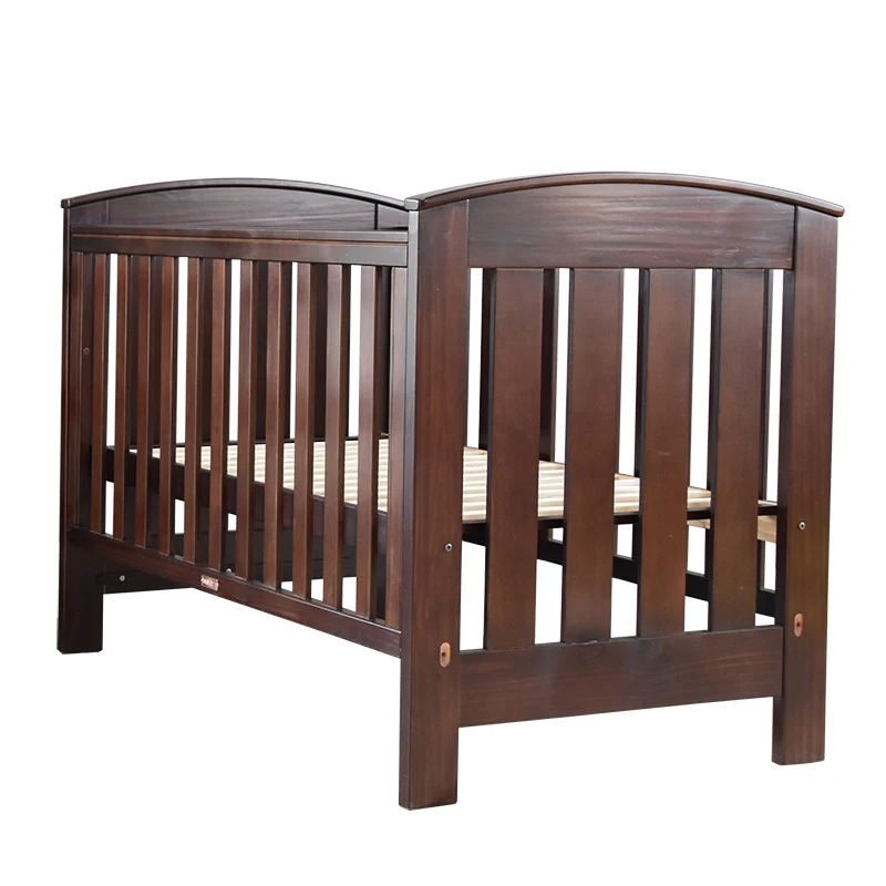 

Solid wood crib can be lifted and lowered