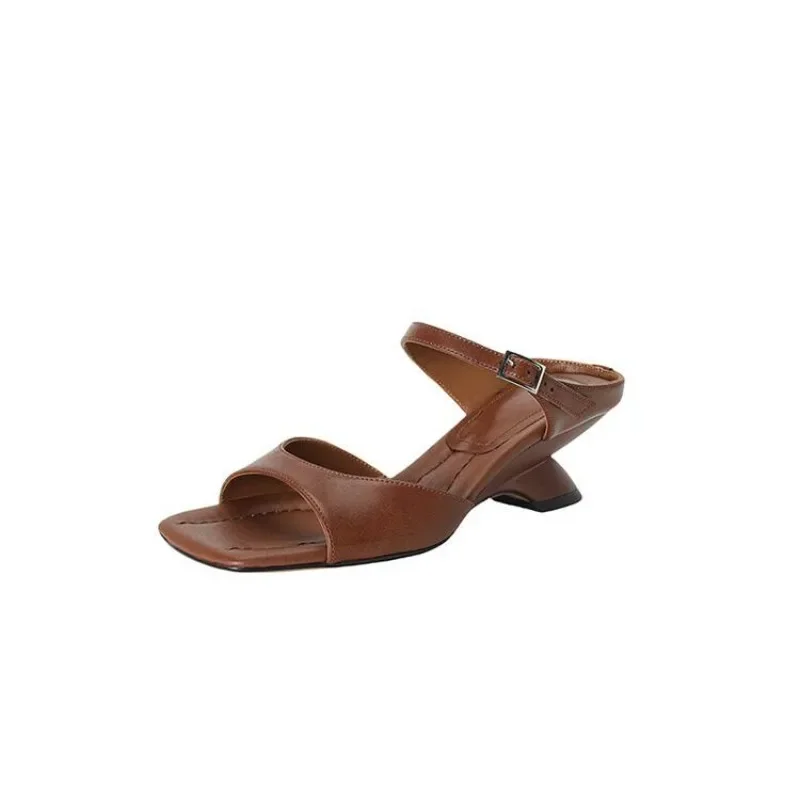 Square toed, thick heeled sandals with unique, minimalist, and stylish designs