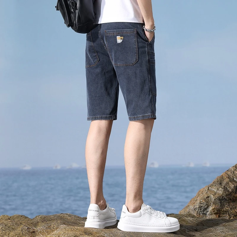 ฤดูร้อนใหม่ตรงกางเกงยีนส์ผู้ชายกางเกงขาสั้นยืดนุ่ม Multi-Pocket Casual กางเกงยีนส์สั้นแฟชั่นล้างบางกางเกงขาสั้นชายเกาหลี