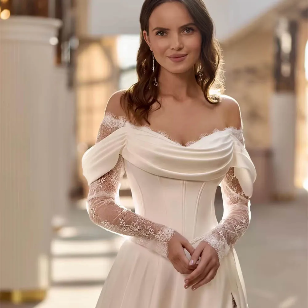 Elegancka suknia ślubna na zamówienie dla panny młodej, satynowa, w stylu boho, z dekoltem w serduszko, długie rękawy, miękka linia A, tren dworski, suknia ślubna typu vestido.