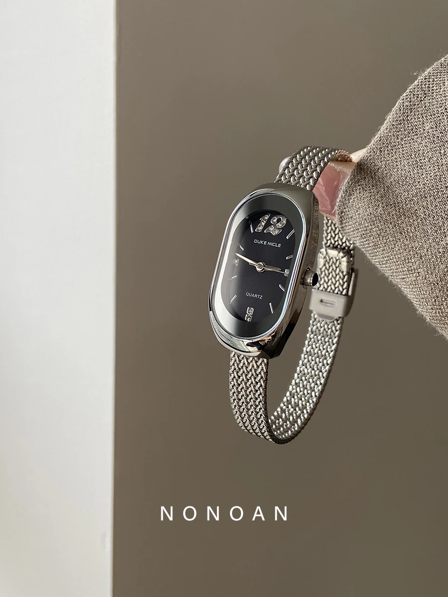 

Sophisticated, minimalist, versatile women's digital quartz watch; fashionable and understated luxury; a perfect gift for women.