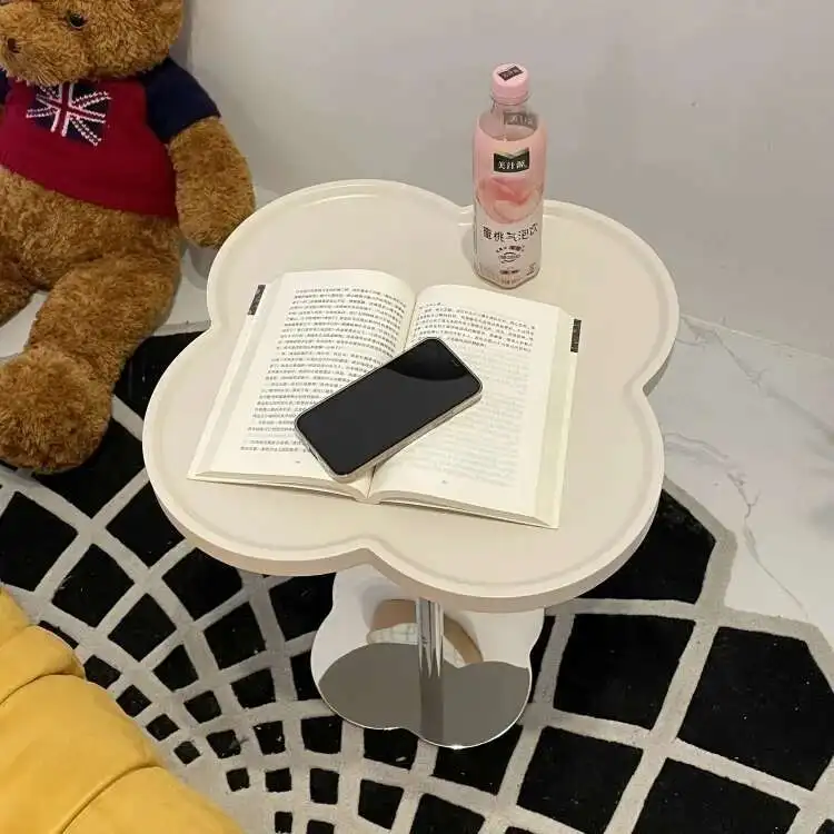 

Living room sofa side a few simple cream style flowers mini coffee table small household corner a few bedside small table