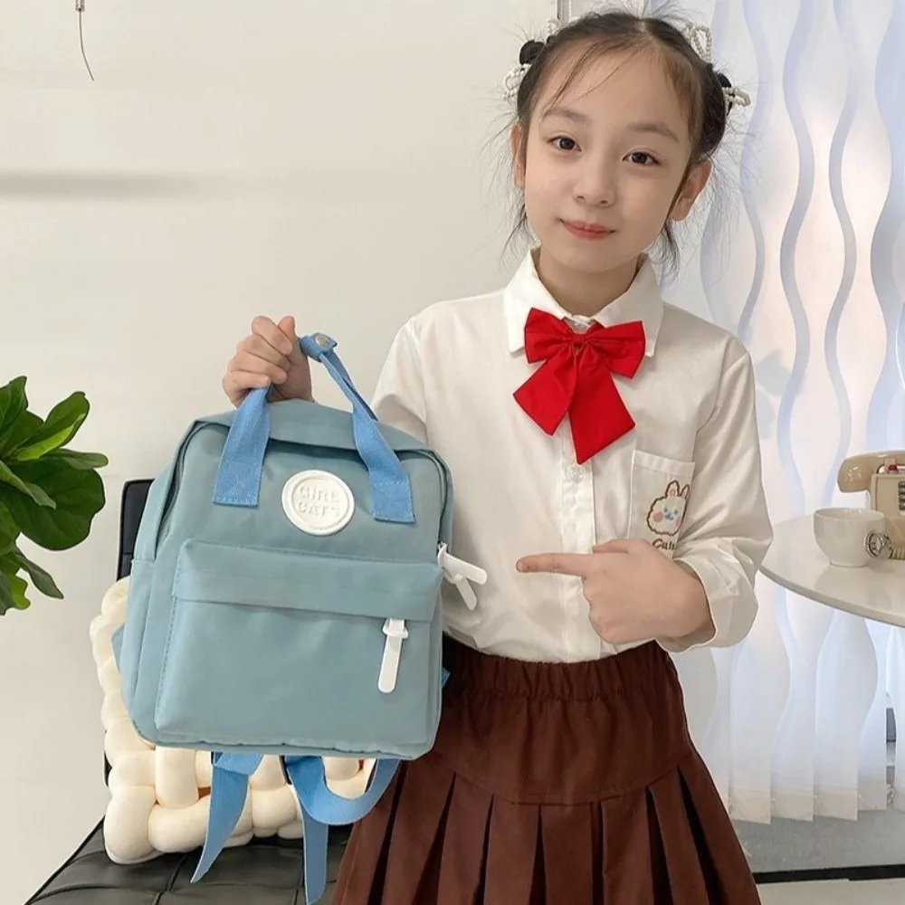 

Solid Color Children Backpack Large Capacity Anti-theft Student School Bag Oxford Cloth Multifunction Canvas Rucksack Travel