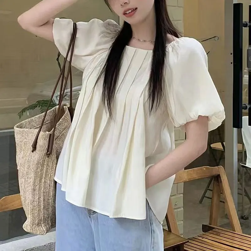 Chemisier à col carré pour femmes, vêtements de Style français, manches bouffantes, nouvelle couleur unie, chemises amples à la mode, pliables, été