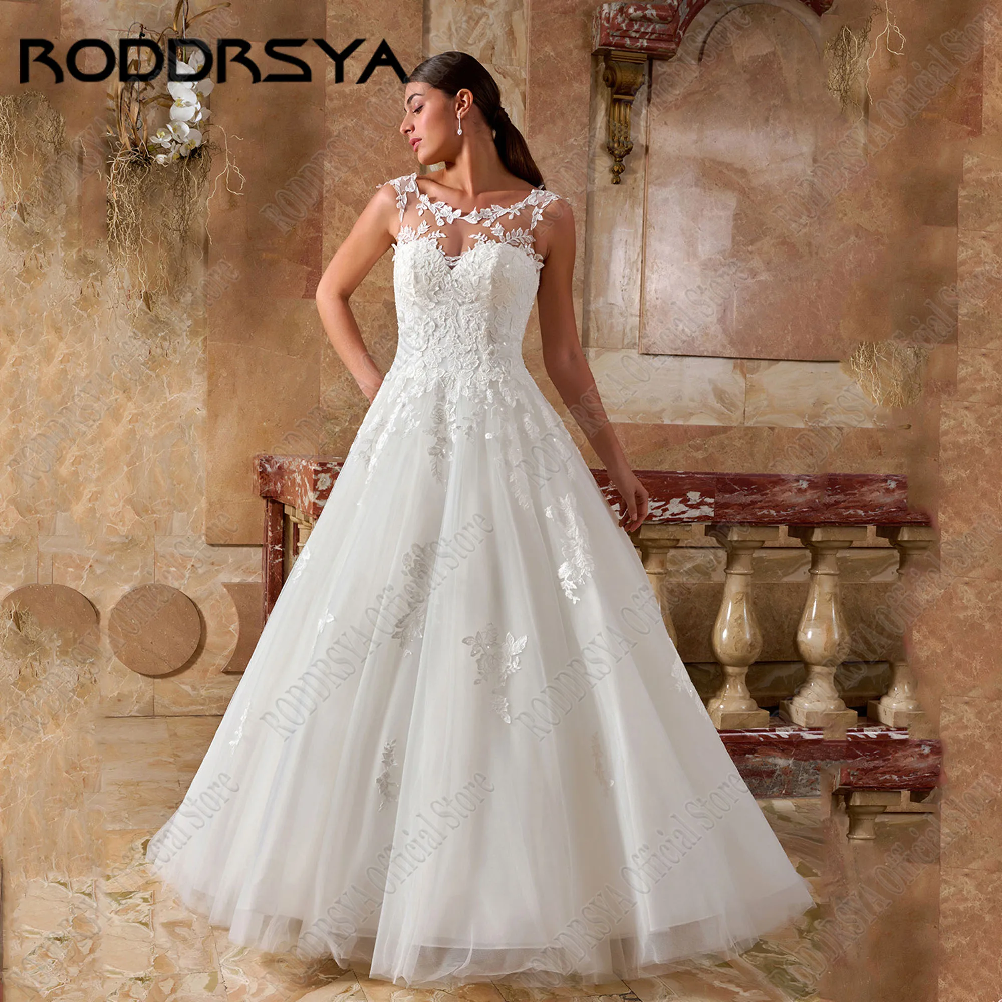 

RODDRSYA Beach Wedding Dress Applique O-Neck Lace Bride Party Gowns Cap Sleeves Sweep Train robe de mariée fluide Customized