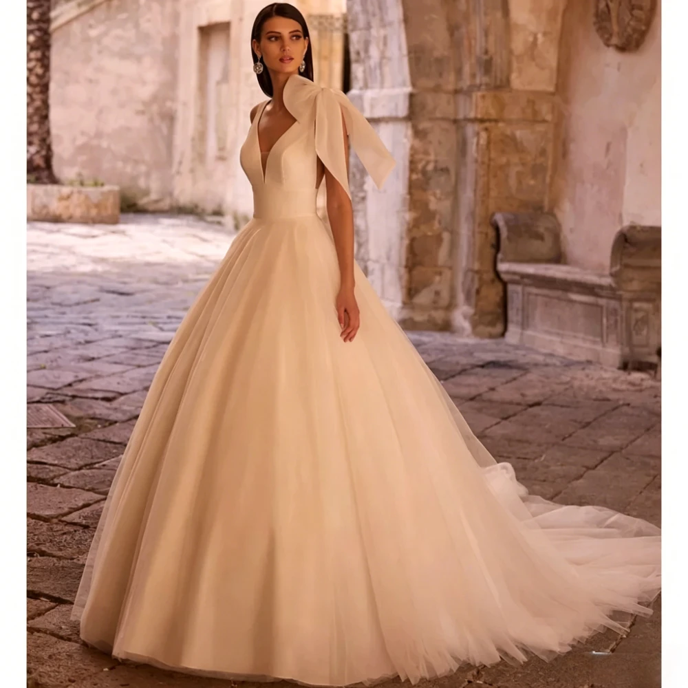 Customized Minimalist A Line Wedding Dress Deep V Sleeveless Single Shoulder Big Bow Soft Tulle Floor Length Bridal Gown