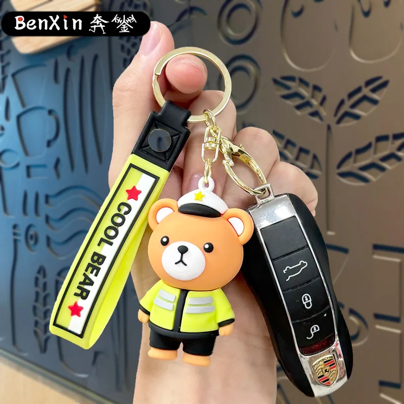 Minso Cartoon-Polizeibär-Schlüsselanhänger, Feuerwehrmann-Bärentaschen, Autoanhänger, Krallenmaschinen, kleine Geschenke für den Straßenstand