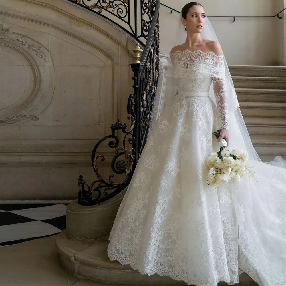 魅力的なボートネック長袖ウェディングドレスエレガントなカスタマイズされたAラインベスティドデノビア高品質アップリケレースブライダルドレス