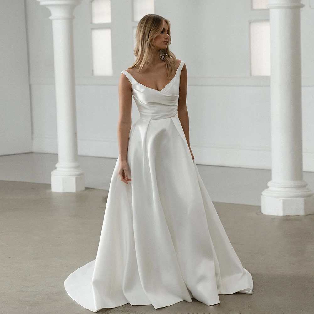 Semplici abiti da sposa senza maniche bianchi per le donne Growns da sposa con spalline sottili con scollo a v Vestidos De Novia Backless 2024