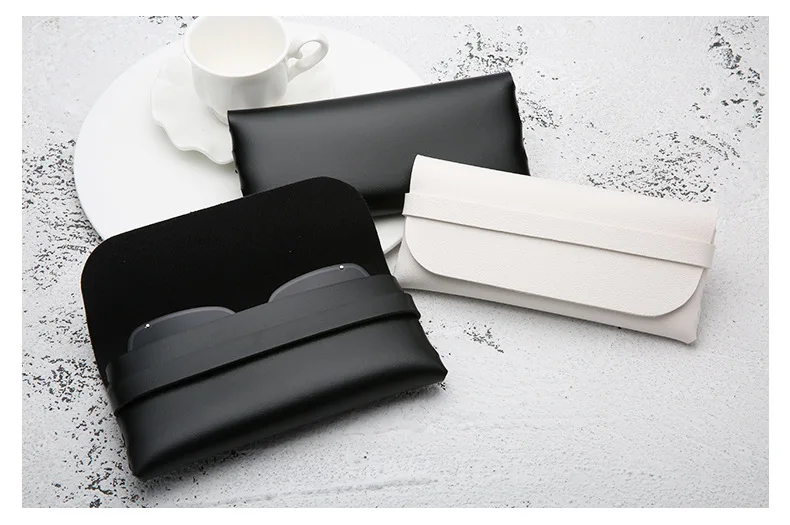 Schwarz-weiße Brillenetuis aus weichem und stilvollem Leder – Brillenschutztaschen, Reisezubehör für Männer und Frauen – stilvoll – Detail 2
