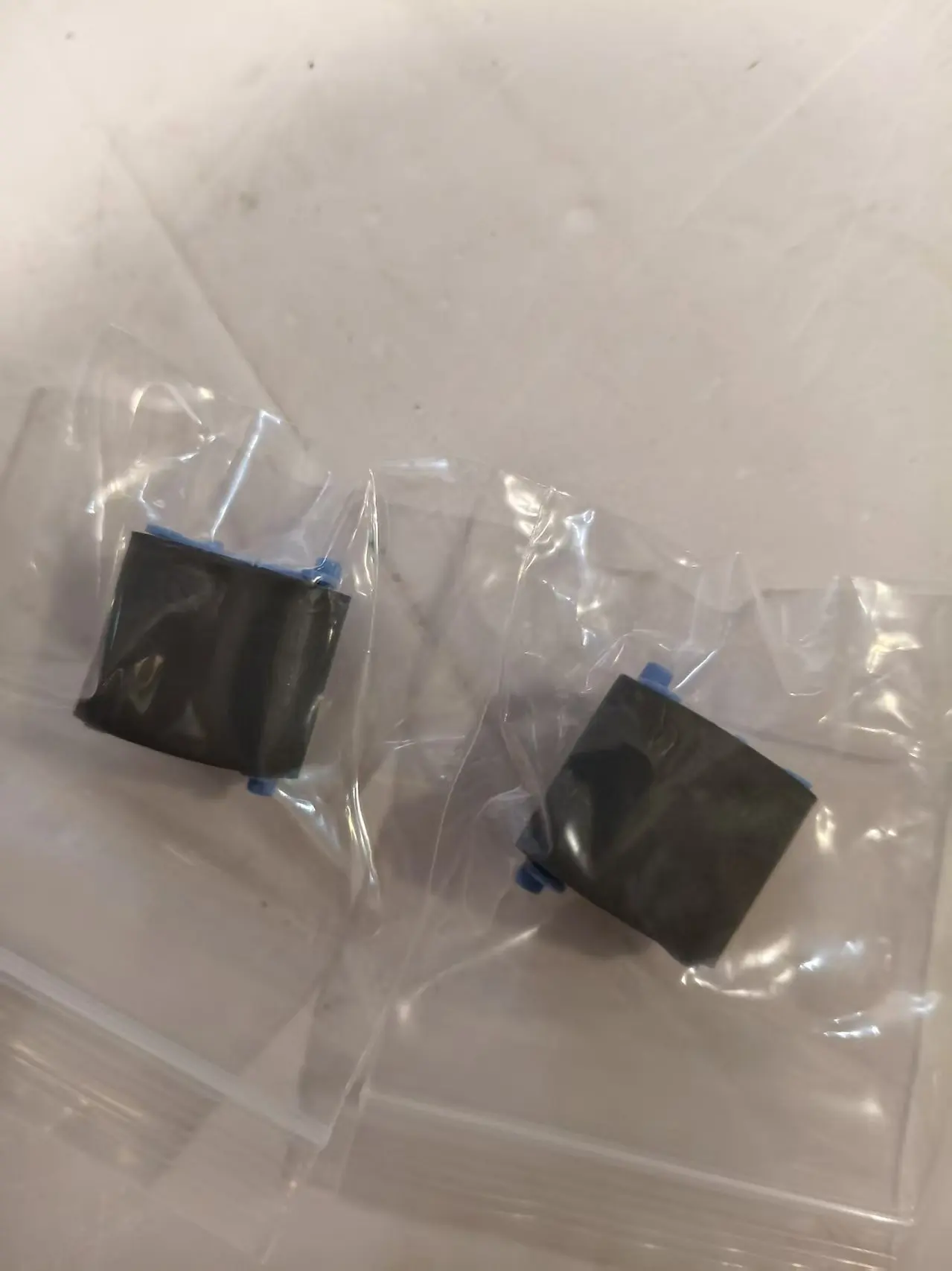 

10 шт. роликов захвата бумаги RL1-1442-000 RL1-1443 для HP P1005 P1006 P1007 P1008 P1009 P1108 P1106 P1102 P1102W M1132 M1213 M1216