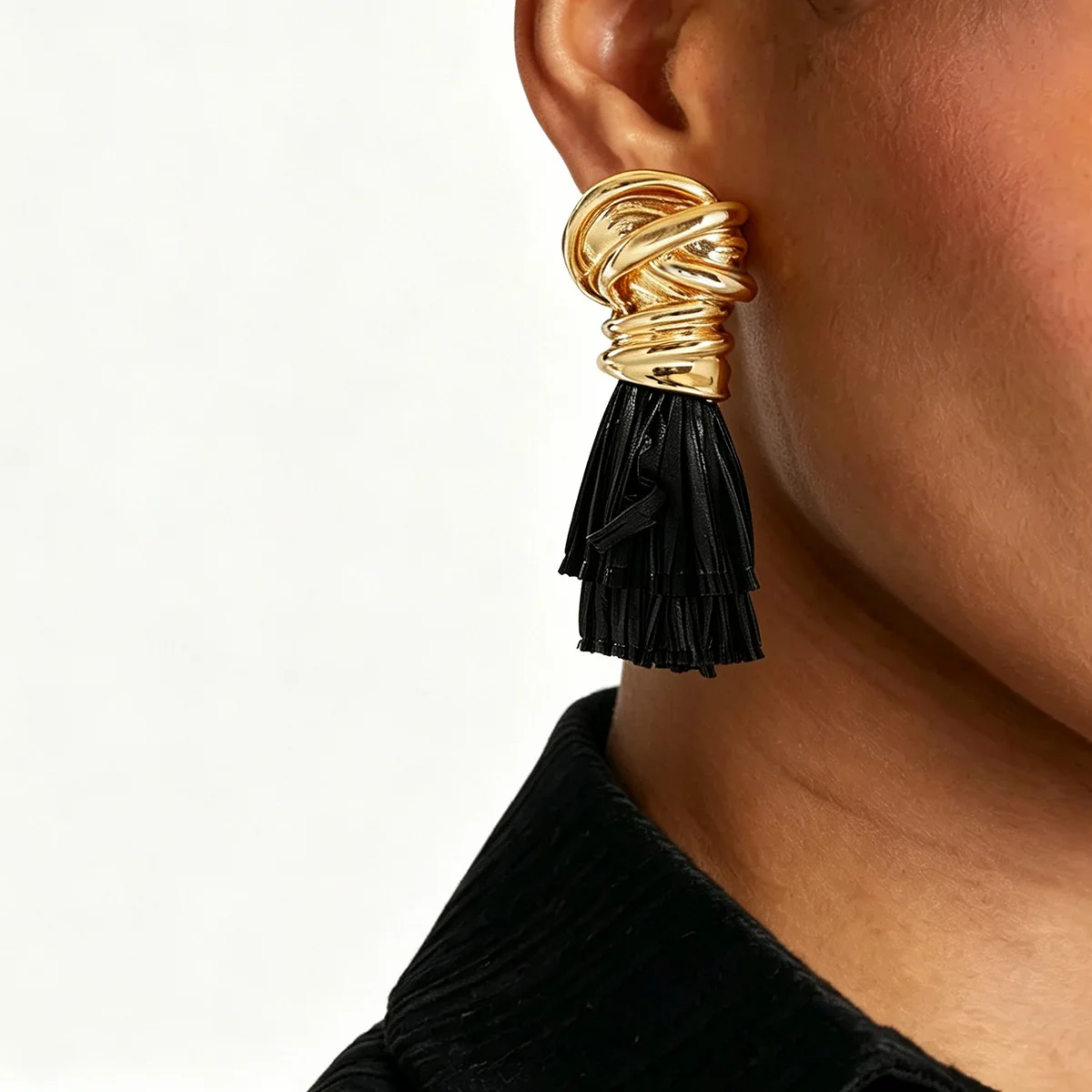 Cross border design retro Lafite grass tassel earrings with vacation style, metal twisted earrings