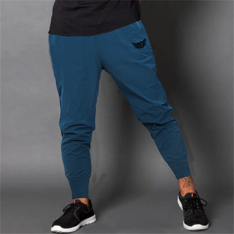 Mens Autumn Fashion Breathable Fitness Streetwear Elastic Waist Bodybuilding Letter Printed Trousers 4 Colors