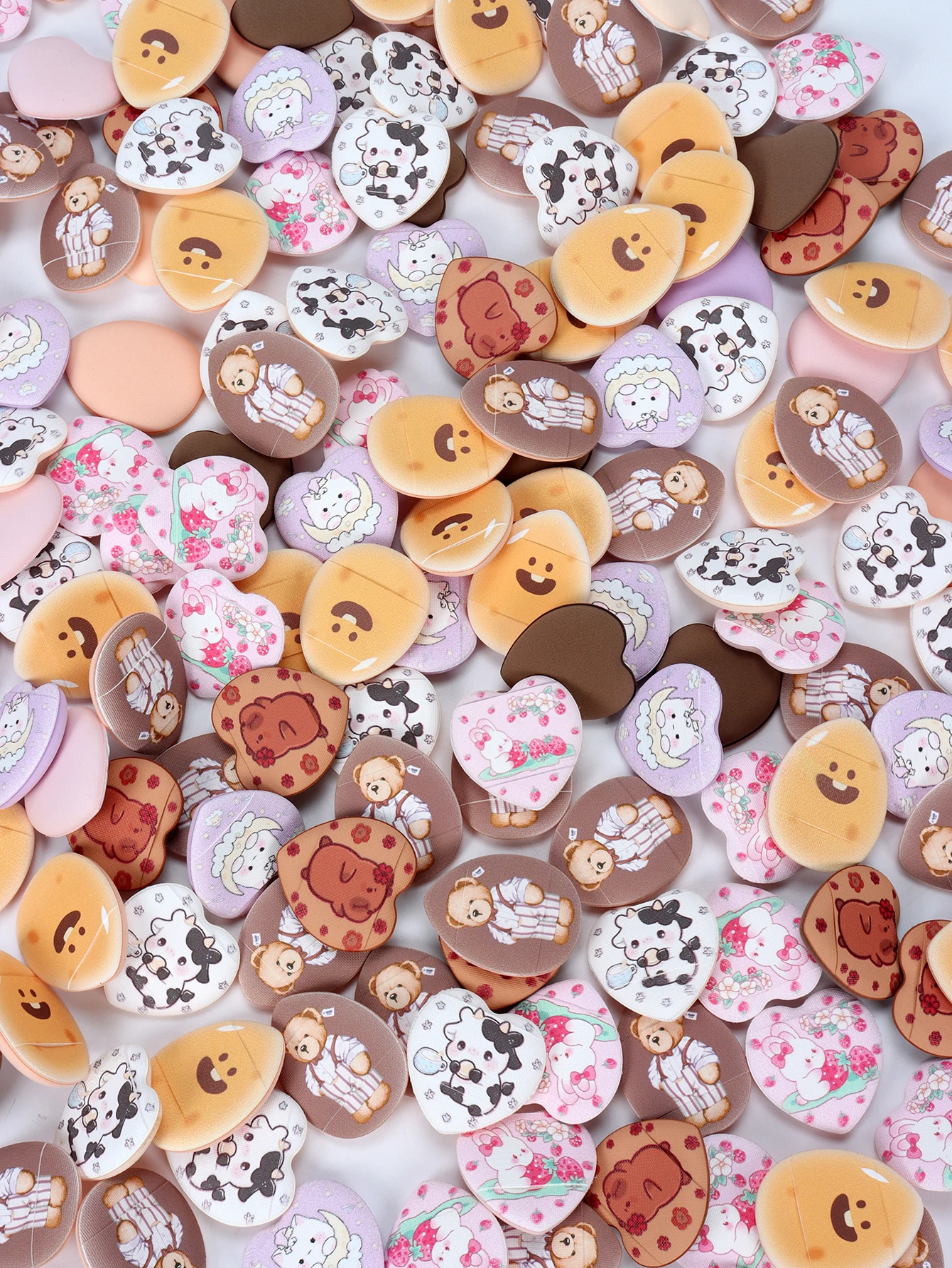 ランダムに印刷された指用パウダーパフ 5-10-20-50-100 個、水にさらされると膨らむ、湿った状態でも乾いた状態でも使用できます