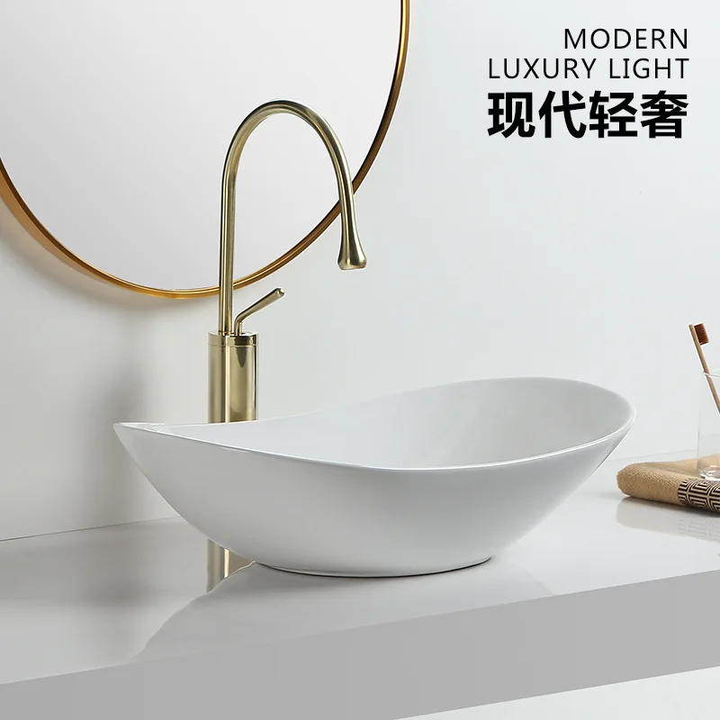 

Simple new ultra-thin countertop basin ceramic toilet washbasin washbasin basin oval ingot-shaped balcony sink