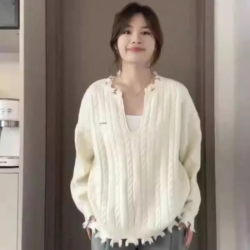 Korean White V-neck Long Sleeved Sweater with Torn Holes and Rough Edges Female Design Sense Niche Gentle and Lazy Style Top